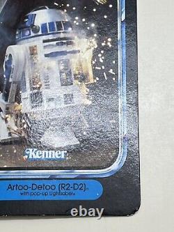 Vintage kenner star wars R2-D2 action figure, MOC pop up lightsaber, unpunched